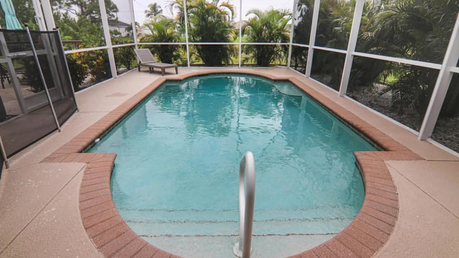 Tropical Corner Property with Heated Pool in Cape Coral